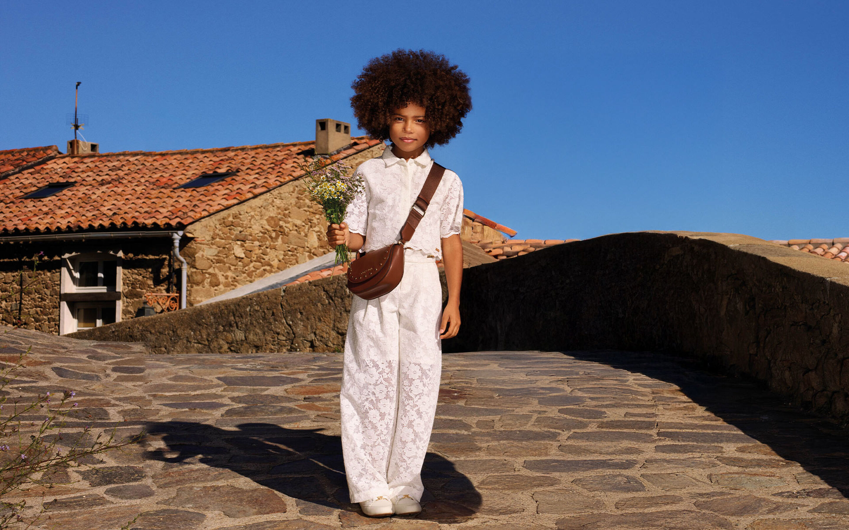 coats Michael Kors brand on kids around