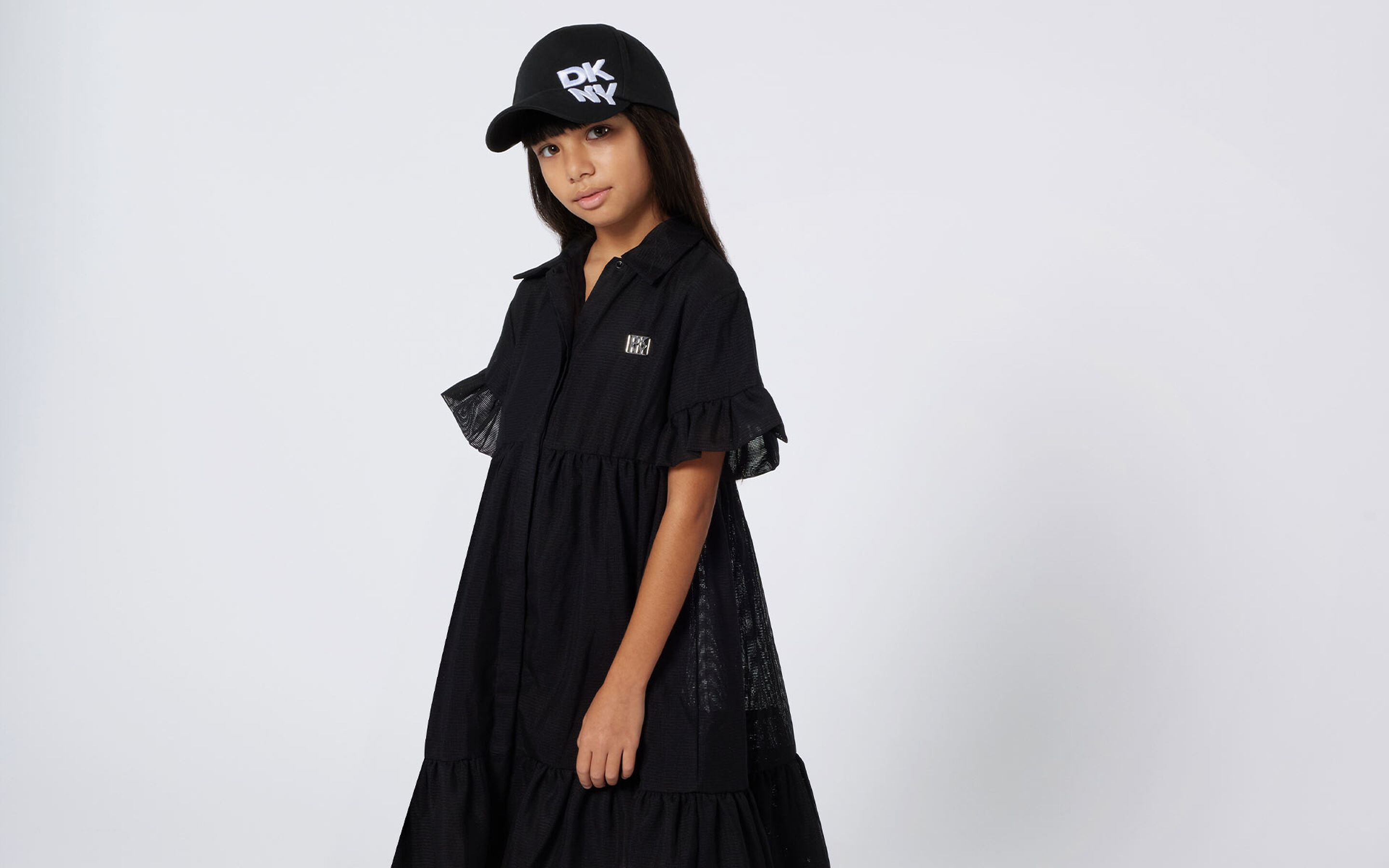 Dresses DKNY brand on kids around