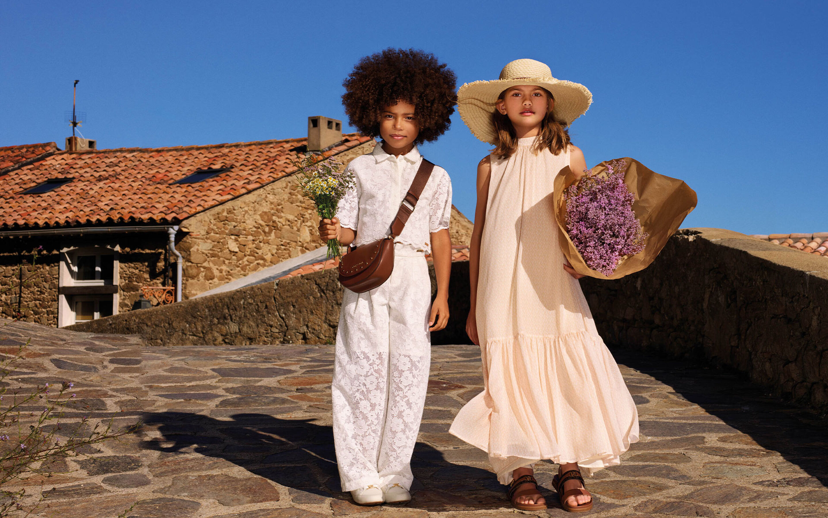 coats Michael Kors brand on kids around