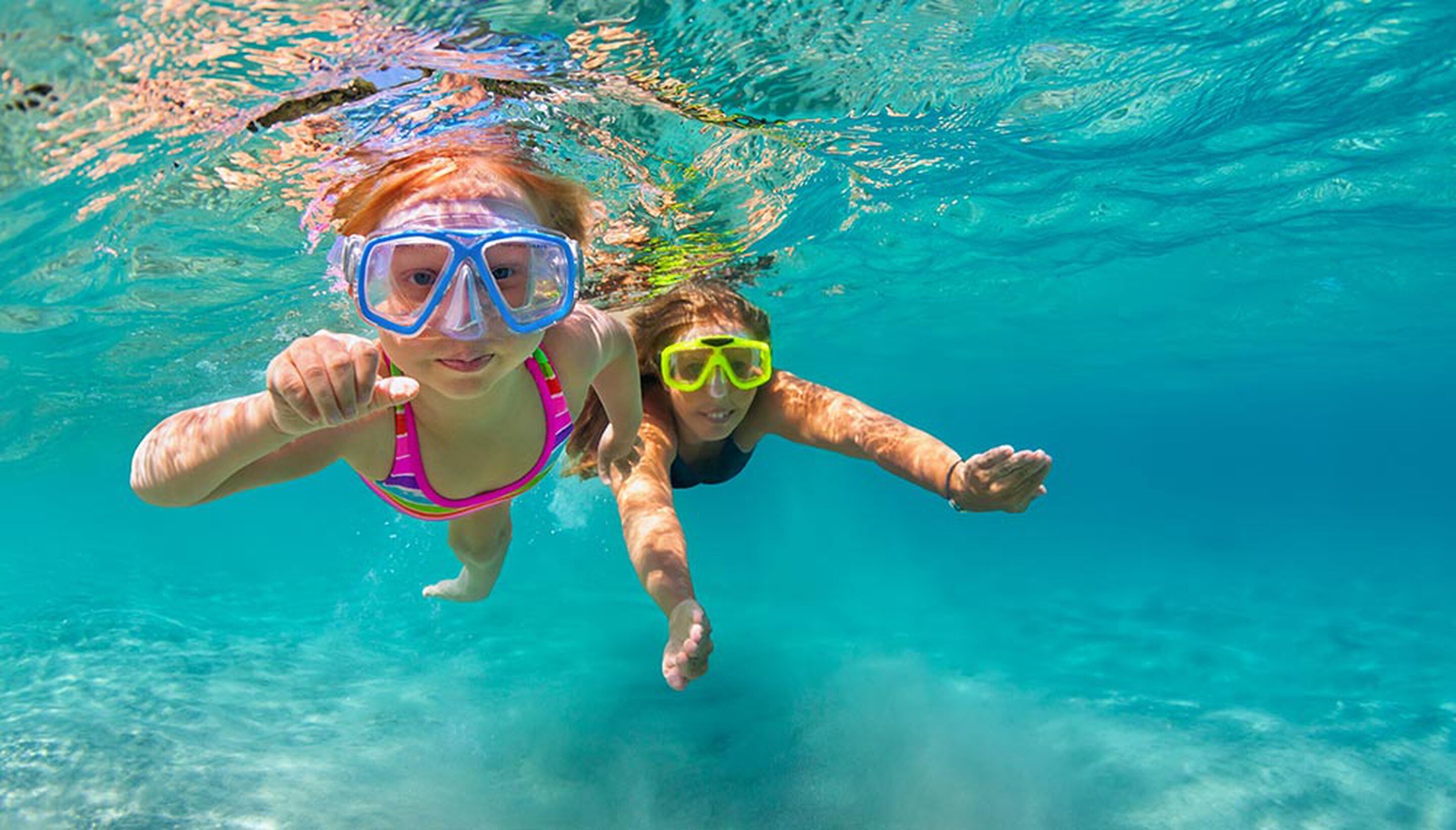 Luxury beach day for children – sun hats, swimsuits, and playful activities