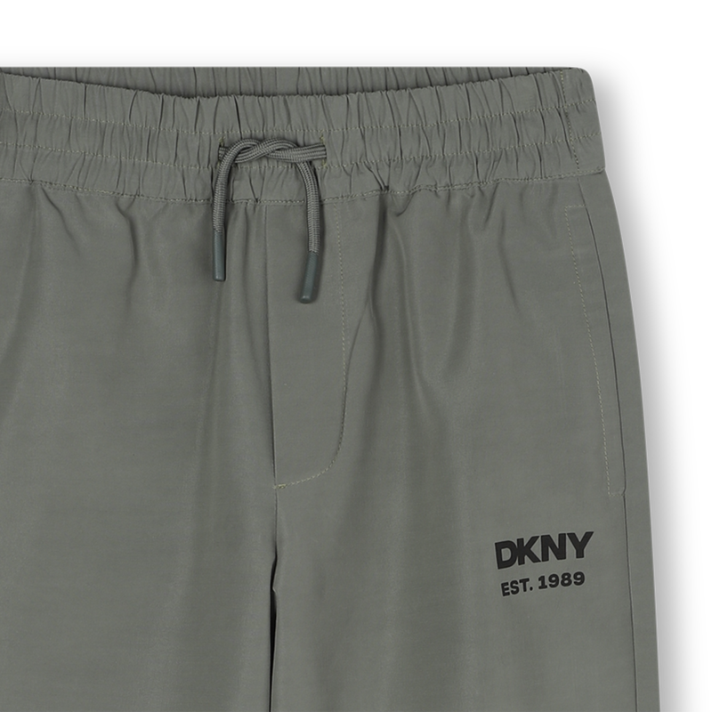 Water-repellent trousers DKNY 
                        BOY