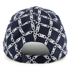 Satin-look patterned cap MICHAEL KORS 
                    GIRL