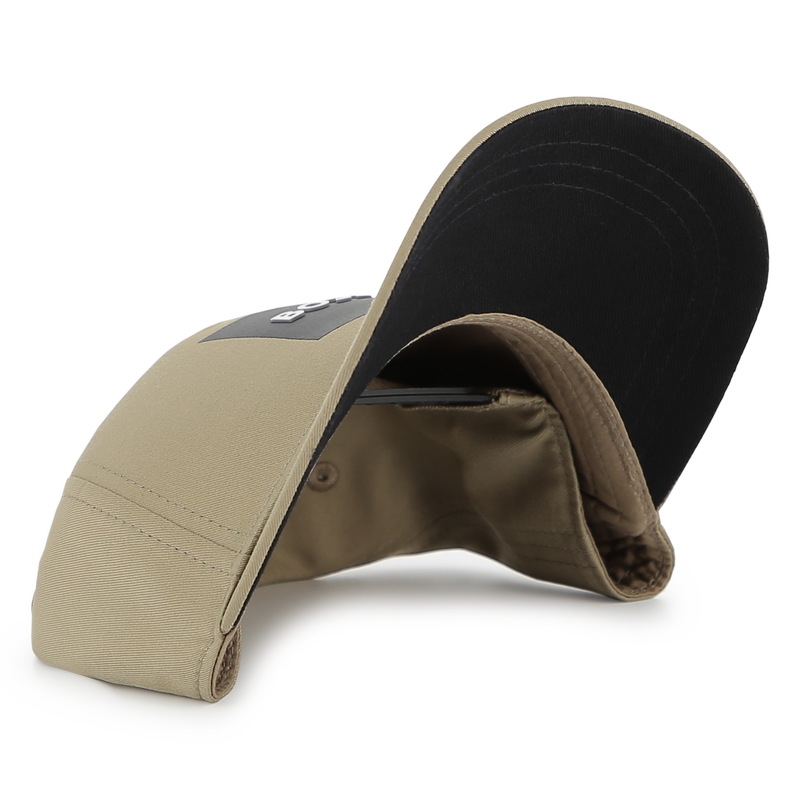 CAP WITH ADJUSTABLE CLOSURE BOSS 
                        BOY