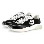Lace-up sneakers with badge KARL LAGERFELD KIDS 
                    GIRL