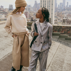 Pants embellished with silver sequins DKNY 
                    GIRL