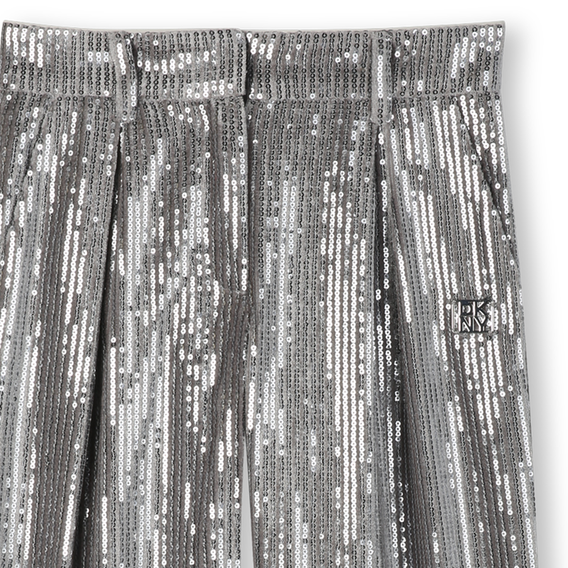Pants embellished with silver sequins DKNY 
                        GIRL